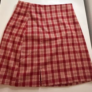 Super cute skirt for any dinner occasion or holiday. One size brandy Melville.